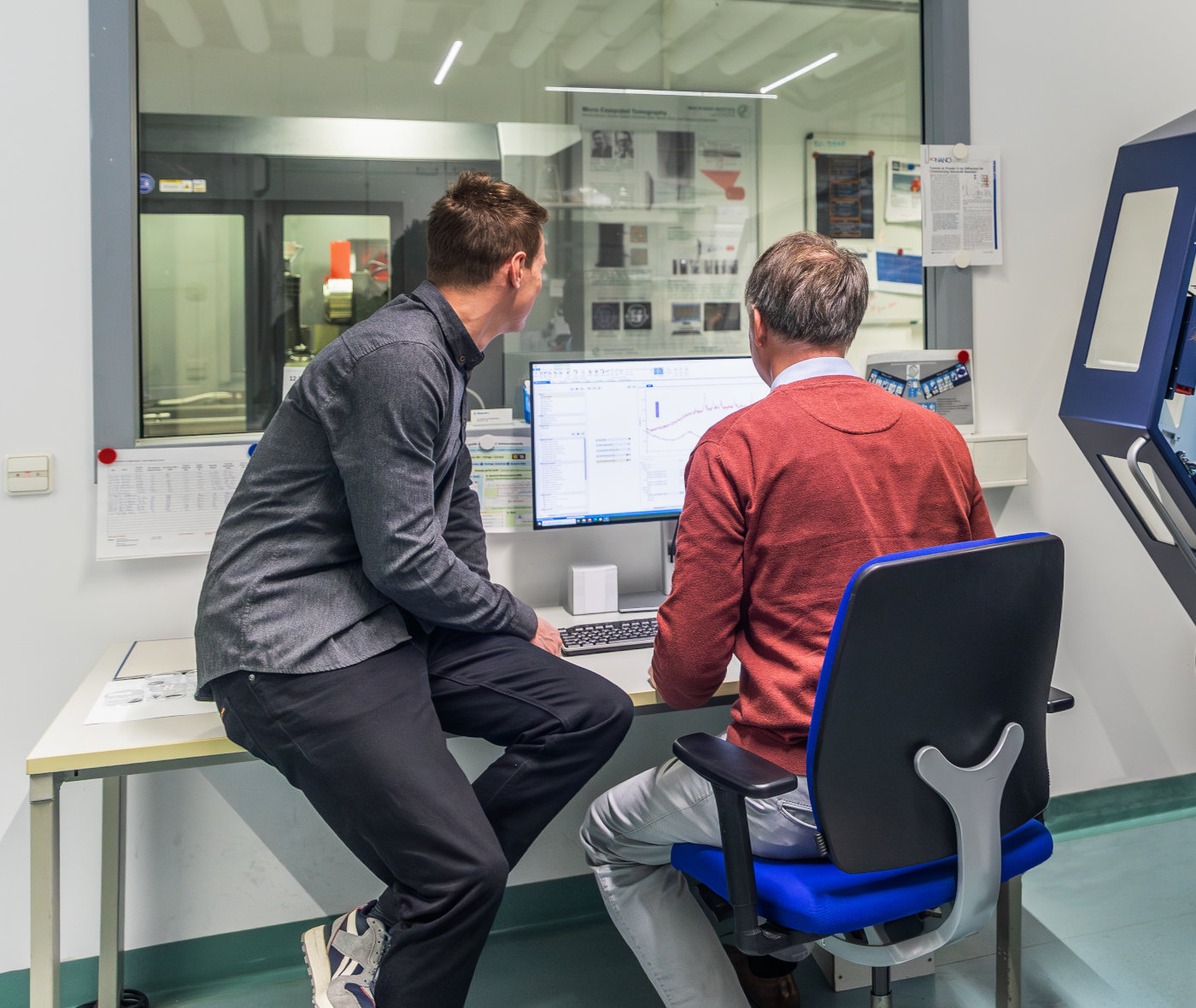 picture of the two leading ioviso members at work